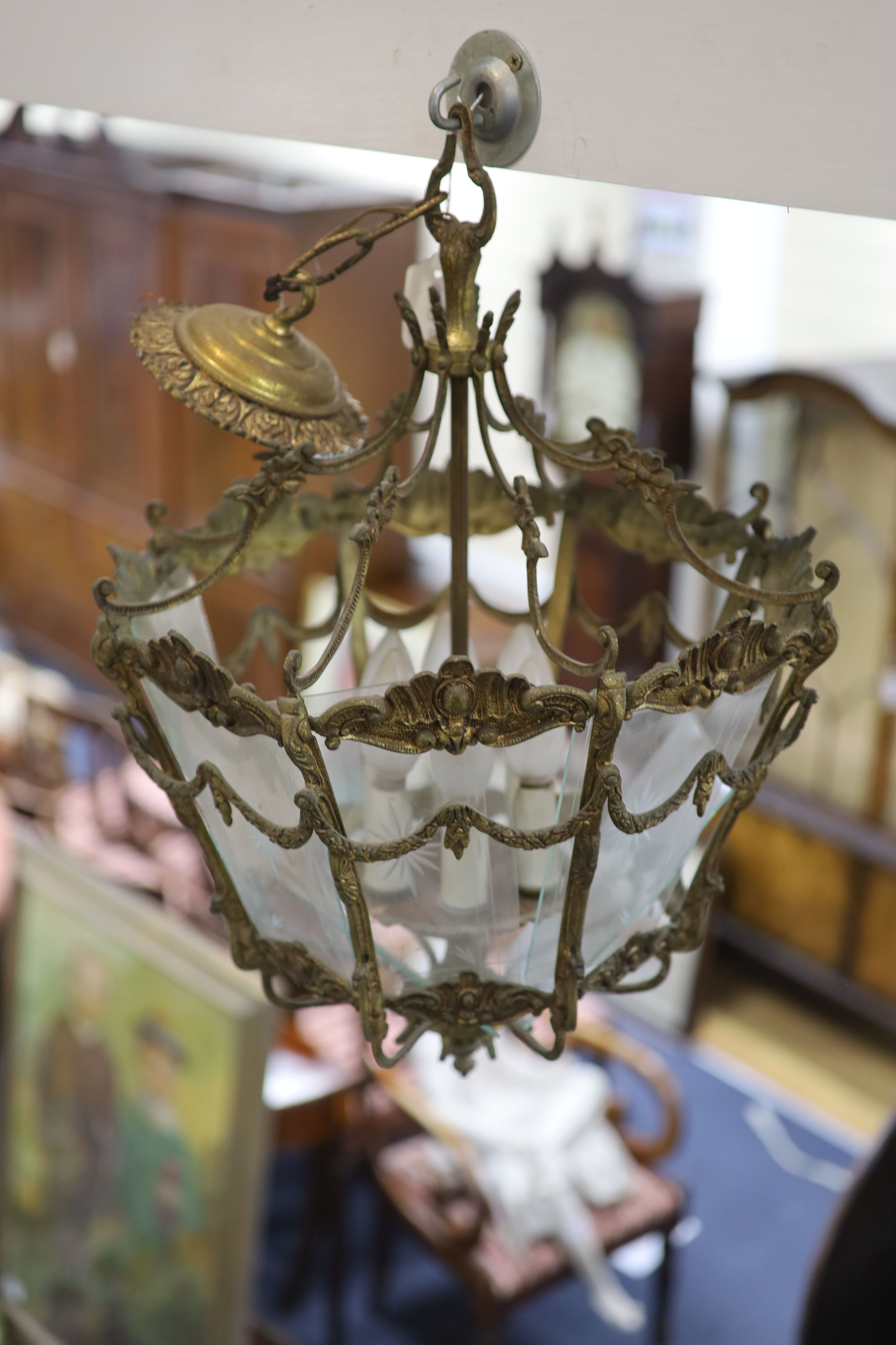 A Victorian gilt metal eight glass panelled hall lantern